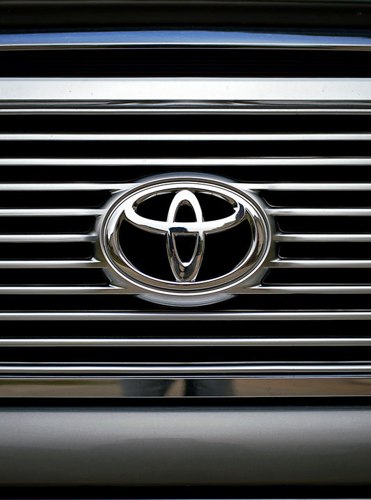 The image shows a toyota grill and logo.