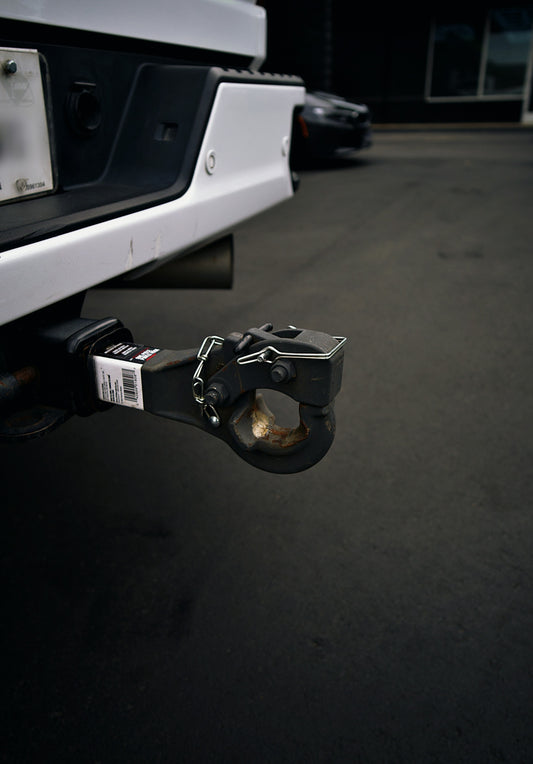 Truck's trailer hitch ready for towing.